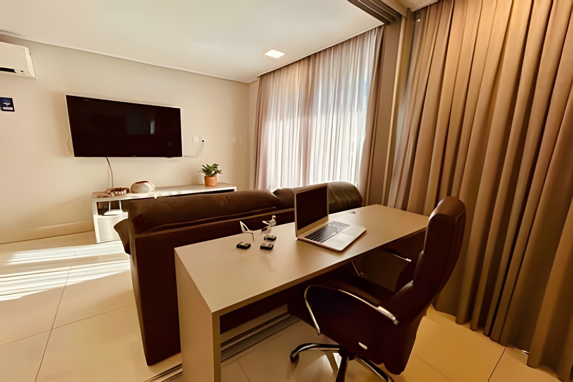 Deluxe Apartment, 1 Bedroom | Living area | 38-inch TV with satellite channels
