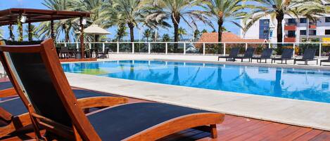 Deluxe Apartment, 1 Bedroom | Pool | Outdoor pool, a heated pool