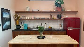 Fridge, microwave, stovetop, coffee/tea maker