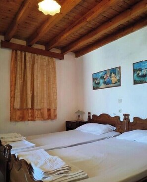 3 عدّة غرف نوم ومكواة/لوح كي وخدمة الإنترنت وملاءات أسرّة