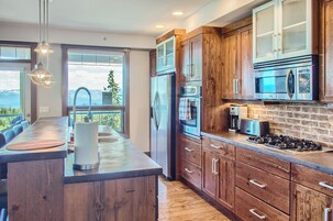 Condo | Private kitchen | Full-size fridge, microwave, oven, stovetop