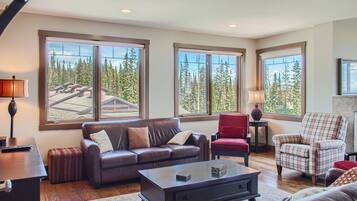 Condo | Living area | 40-inch flat-screen TV with cable channels, fireplace