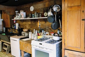 Coffee/tea maker, fridge, microwave, oven