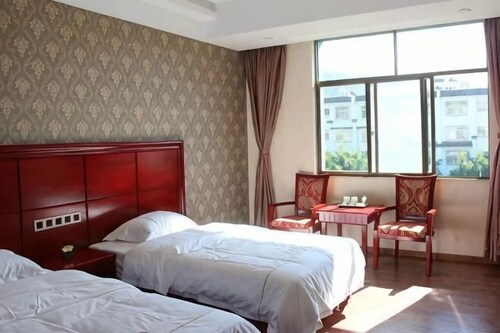 Zhen Kangxin Futai Hotel