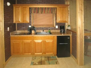 Fridge, microwave, stovetop, coffee/tea maker