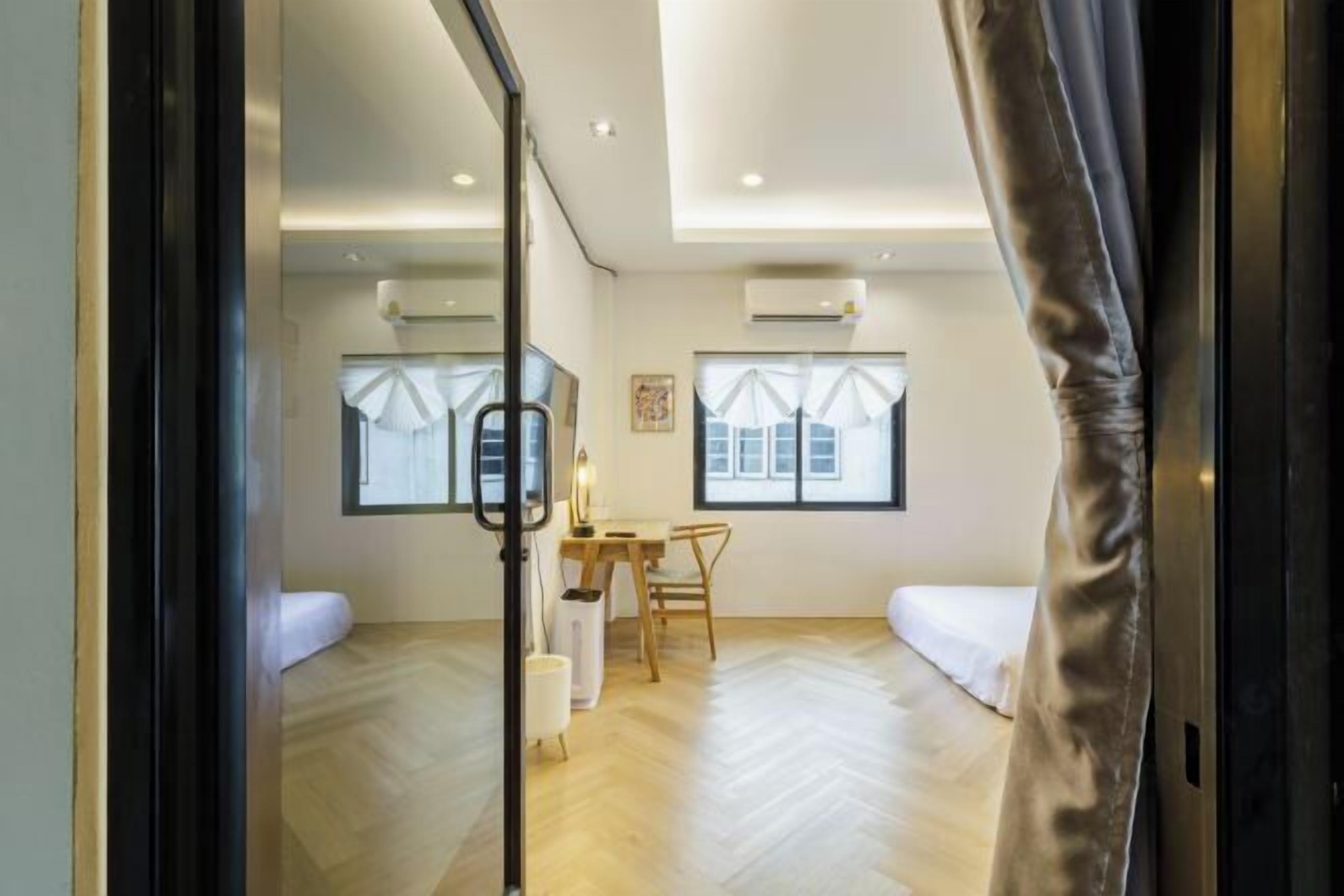 Premium bedding, desk, laptop workspace, free WiFi