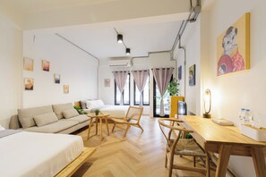 Premium bedding, desk, laptop workspace, free WiFi