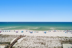 On the beach, sun loungers, beach towels