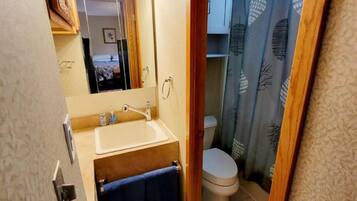 Hair dryer, towels, soap, toilet paper