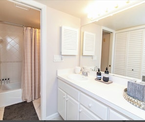 Hair dryer, towels, soap, toilet paper
