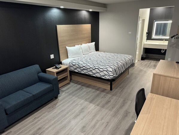 Desk, laptop workspace, blackout curtains, iron/ironing board