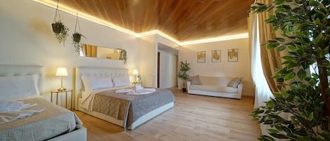 Chambre Quadruple Supérieure | Fer et planche à repasser, Wi-Fi gratuit