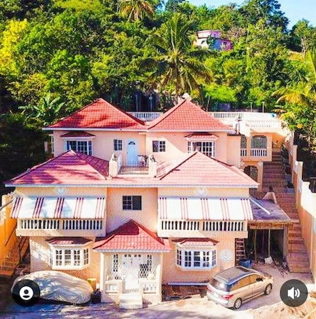 Exterior. Cozy upstairs apartment for two with great views. Book your stay today.