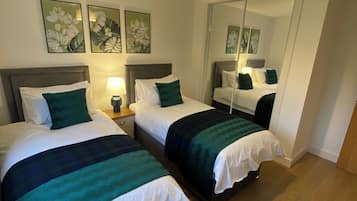 2 dormitorios, tabla de planchar con plancha, wifi y ropa de cama