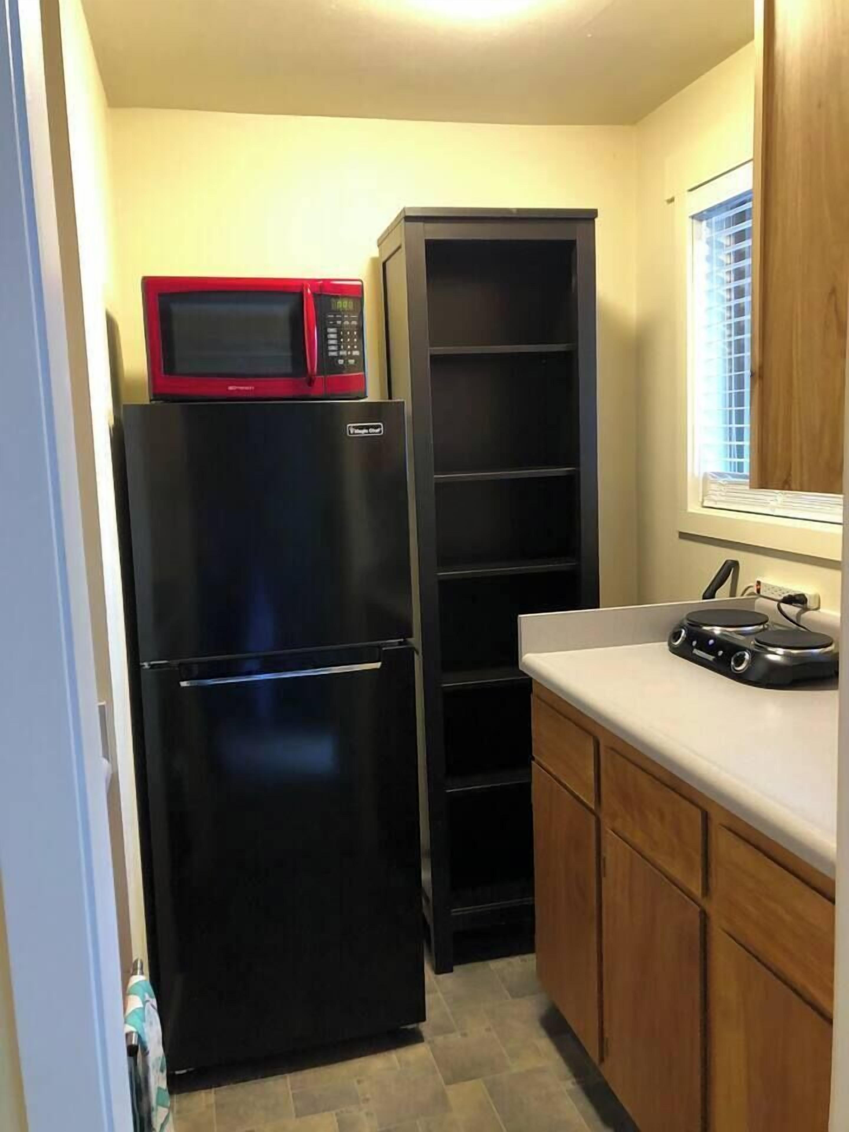 Fridge, microwave, stovetop, coffee/tea maker