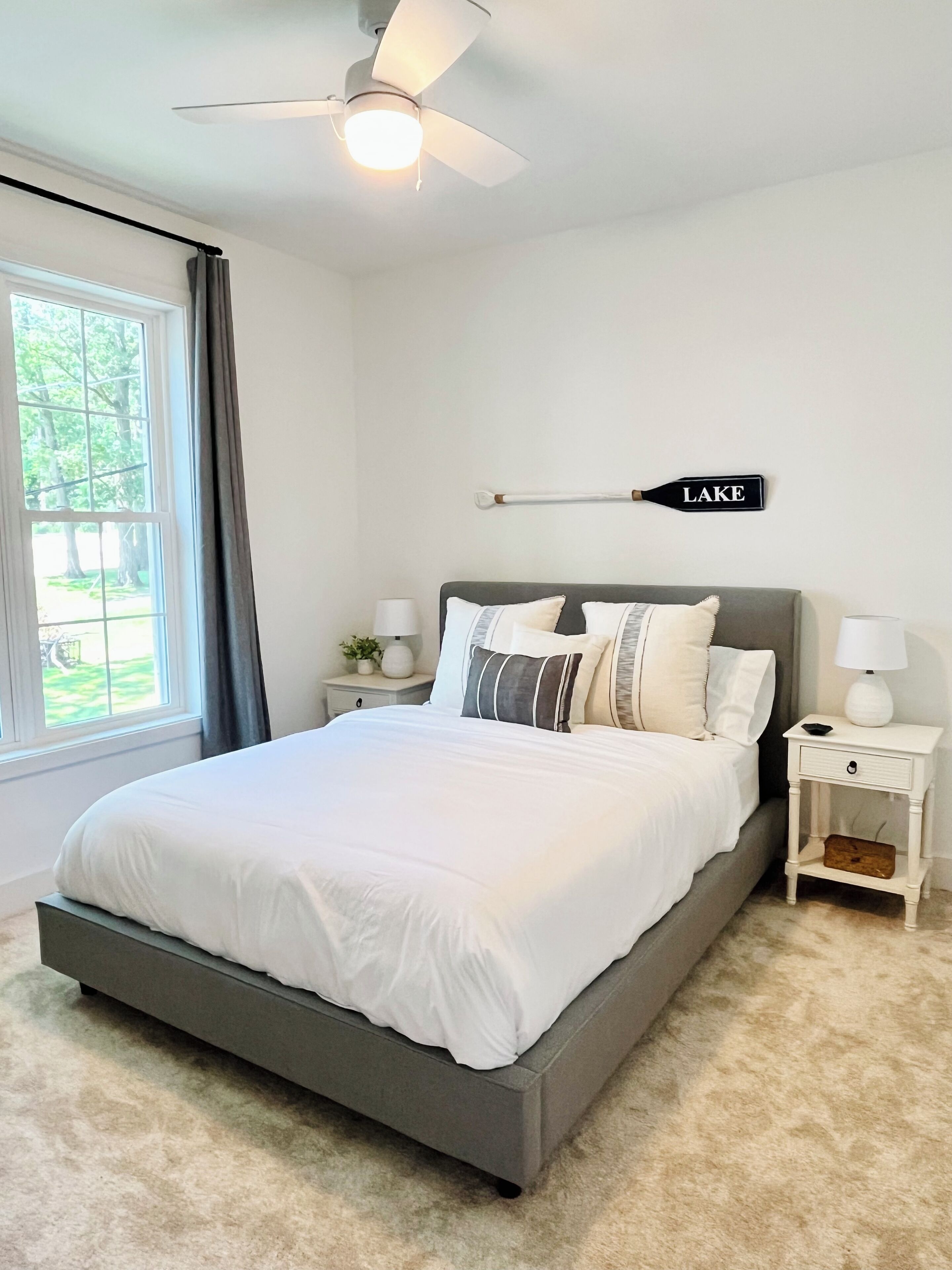 Second floor queen bedroom with full bathroom shared with attic