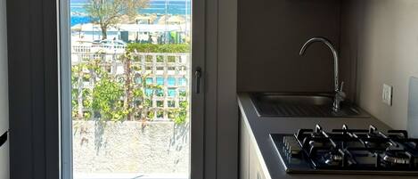 Fridge, oven, dishwasher, dining tables