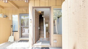 A wooden exterior with a door leading to a staircase. - Val D Sol Retreat: Perfect Sun Valley Base (Sun Valley)