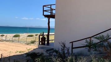 Cabaña Confort, 1 cama King size, vista a la playa, frente al mar | Terraza o patio