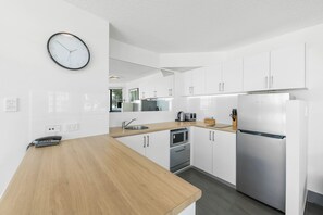 Fridge, microwave, toaster, cookware/dishes/utensils