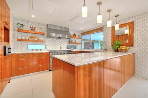 Fridge, microwave, oven, stovetop - Welcome to The Sunset Palms: A Mid-Century Modern Oasis! (Palm Springs)