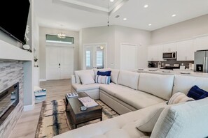 Smart TV, fireplace, books, music library - Beach Hoppers Poolhouse 1007 - Cape Coral 3b/2ba with pool, Off-Water, HSW Internet (Cape Coral)