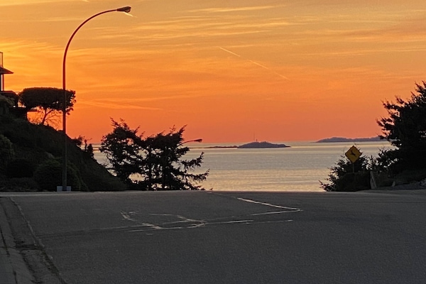 Breathtaking sunset from the sidewalk in front of house