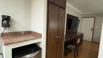 Desk, laptop workspace, free WiFi, bed sheets