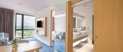 Junior Suite, 1 King Bed, Lake View | Living area | 43-inch LED TV with cable channels