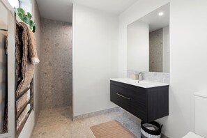 Shower, towels, soap, shampoo