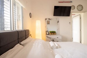 1 slaapkamer, een strijkplank/strijkijzer, gratis wifi