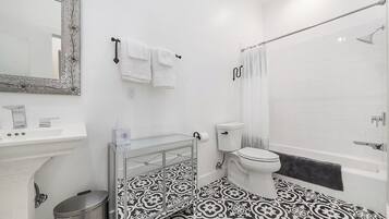 Hair dryer, towels, soap, toilet paper