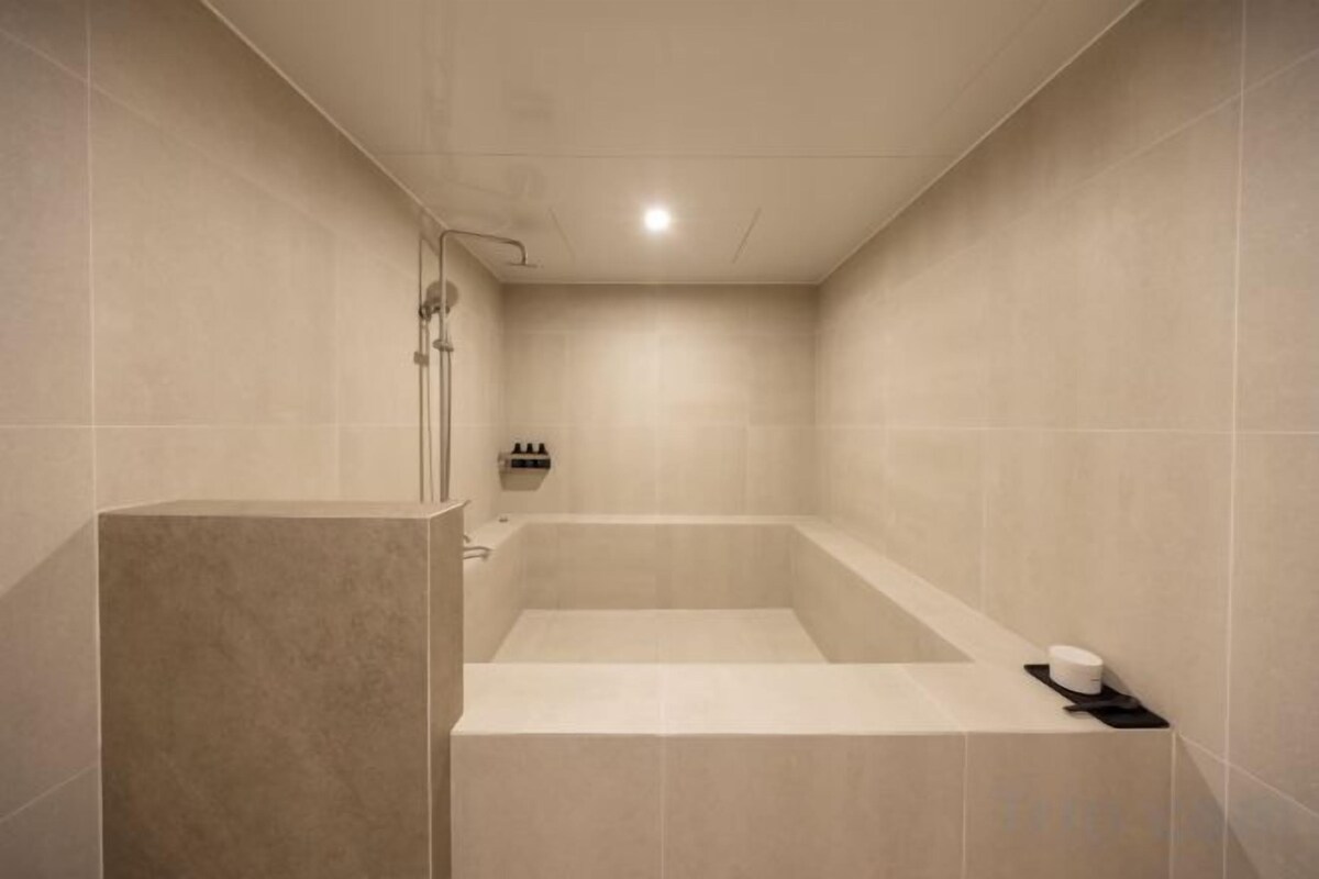 Bathroom | Hair dryer, bathrobes, bidet, towels