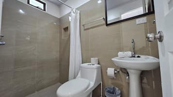 Shower, hair dryer, towels, soap