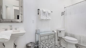 Hair dryer, towels, soap, toilet paper