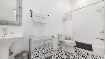 Hair dryer, towels, soap, toilet paper