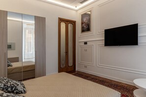 2 habitaciones, tabla de planchar con plancha, wifi y ropa de cama 