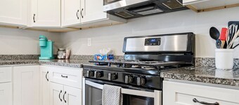 Symphonic Serenity: 2BR Rhythmic Retreat