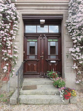 Exterior detail. Hoffarth Apartment with Private Terrace, Garden, and Wi-Fi