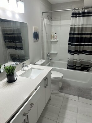 Hair dryer, towels, soap, shampoo