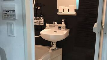 Hair dryer, bidet, towels, soap