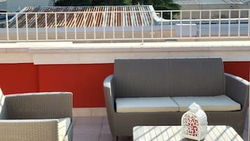 Family Quadruple Room, City View | Terrace/patio