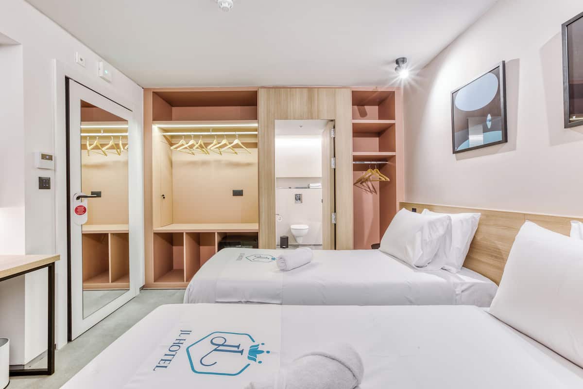 Economy Double or Twin Room | In-room safe, desk, laptop workspace, blackout drapes