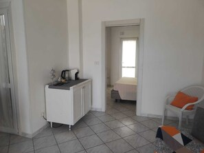 1 slaapkamer, een strijkplank/strijkijzer, wifi, beddengoed
