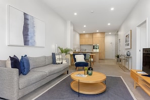 Apartamento, 2 quartos | Área de estar
