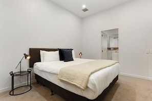 Apartamento, 2 quartos | 2 quartos, ferros/tábuas de passar roupa, Wi-Fi de cortesia