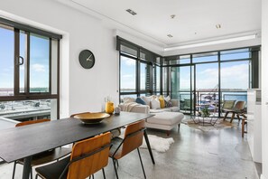 One Bedroom Apartment with Parking | Living area | 55-inch Smart TV with digital channels - Customs Street Apartments by Urban Rest (Auckland)