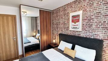 1 slaapkamer, een strijkplank/strijkijzer, wifi, beddengoed