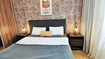 1 slaapkamer, een strijkplank/strijkijzer, wifi, beddengoed