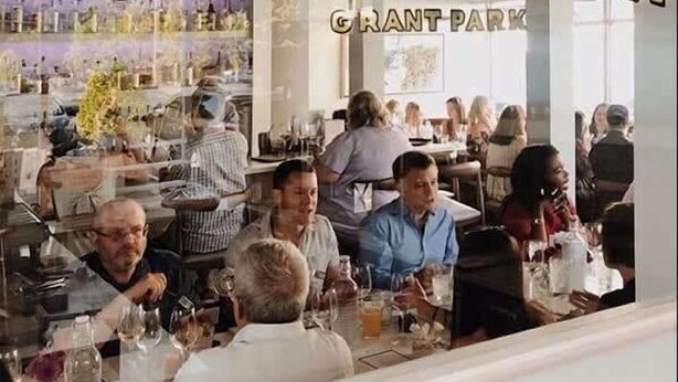 A restaurant interior with patrons dining at tables. - Grant Grandeur (Atlanta)